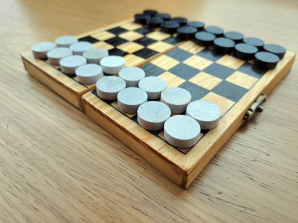 istock Checkerboard with checkers - Business strategy planning 1452724127