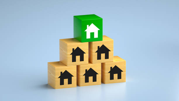Green Home Standing Out From The Crowd Green Home Standing Out From The Crowd green building blocks stock pictures, royalty-free photos & images