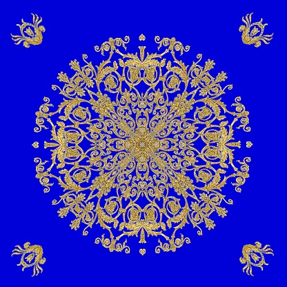 A gold colored circular kaleidoscope pattern on a blue background.  Perfect for a ceiling tile