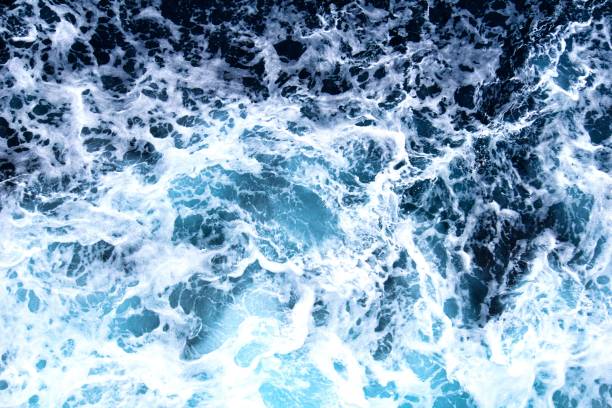 istock Drone image of ocean waves and spray 1452729347
