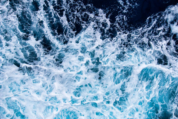 istock Drone image of ocean waves and spray 1452729508