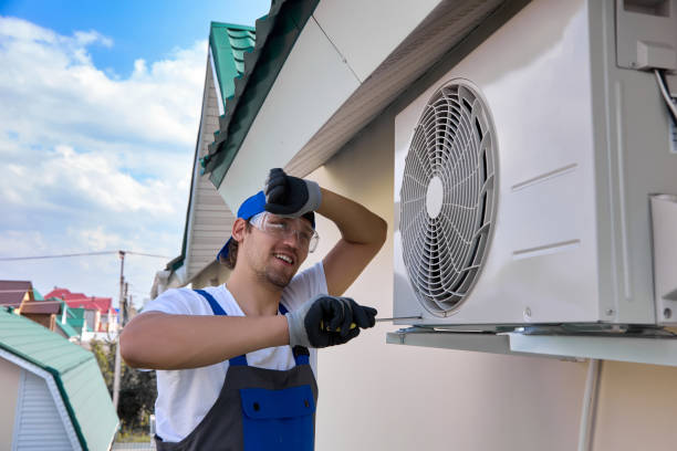 istock Mild fatigue after long repair air conditioner cheerful technician in uniform 1452730791