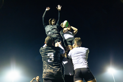 Players performing rugby lineout (touch)