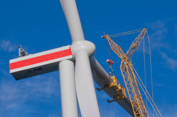 istock Mounting a rotor blade on a wind turbine 1452738508
