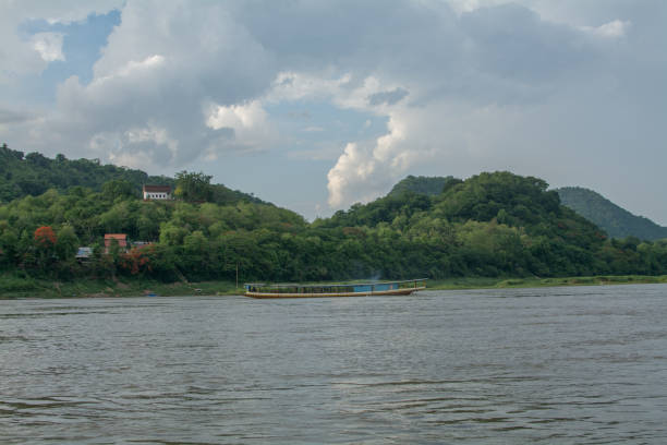 istock Laos ship cruising along the Mekong River in Luang Prabang 1452738521