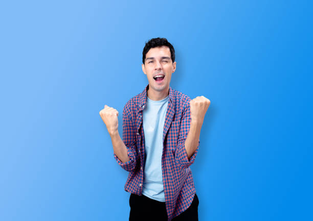istock Man happy and celebrating success 1452739043
