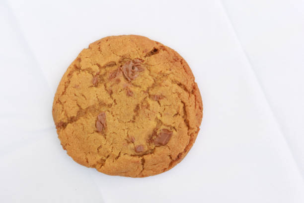 istock a chocolate chip cookies on white background 1452739151
