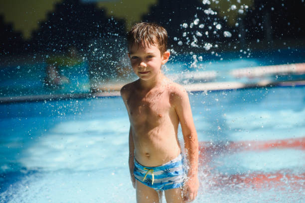 istock Boy having fun in aqua park 1452739216