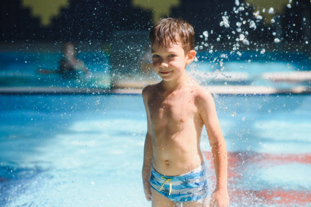 istock boy is in the water park. 1452739295