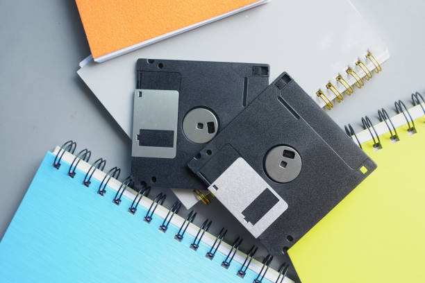 istock an old vintage floppy disk on a gray background. 1452740067