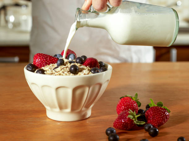 istock Milk and a bowl of muesli 1452740257