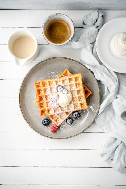 istock Waffles with blueberries and raspberries 1452740678