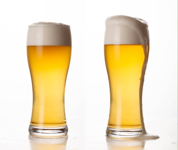 istock Glass of light beer isolated on white background; foam; bubbles; close-up 1452743508