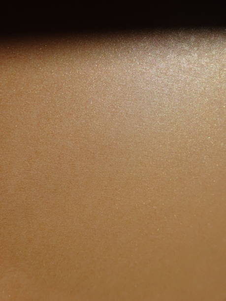 istock Pastel orange gold glitter background with gradient and copy space 1452743808