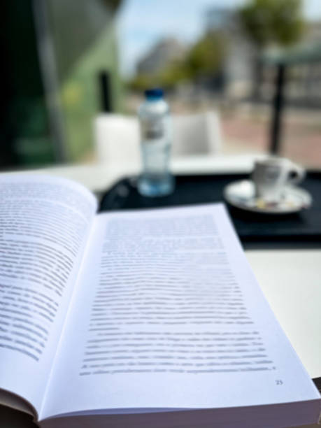 On the terrace in a moment of relaxation reading a book