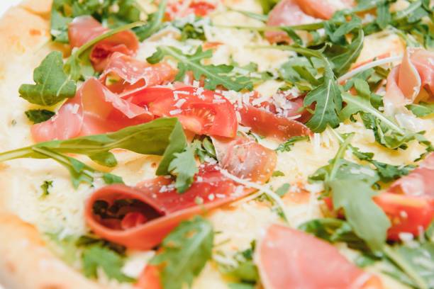 istock Mixed pizza from top isolated on white background clipping path included. 1452745006