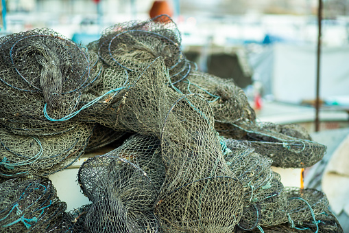 View of Folded Fishing Net at shore.