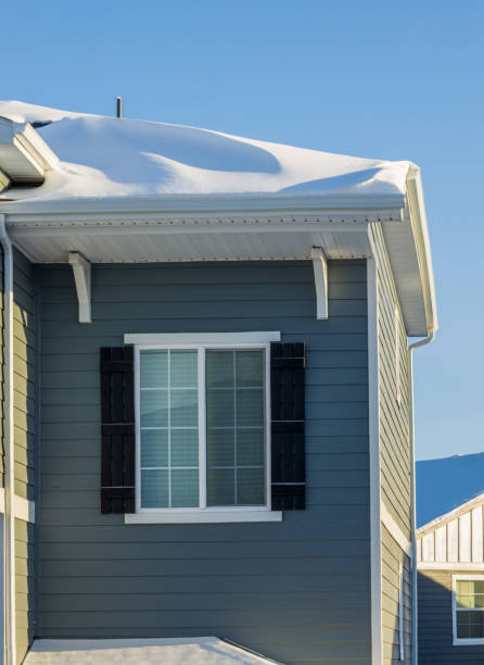 istock Corner of a new house covered by snow 1452747590