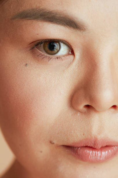 istock Closeup on asian female looking in camera 1452750393