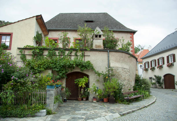 The narrow curved street in Durnstein, the most visited town in Wachau region (Austria).