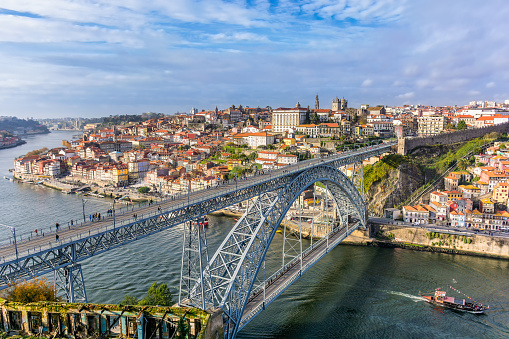 Scenic view of Porto in warm winter light against dramatic sky