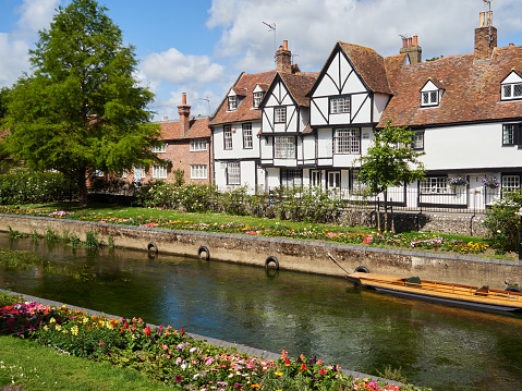Beautiful view of Canterbury in a sunny day with the Stour river and traditional buildings. Canterbury, Kent, England, UK