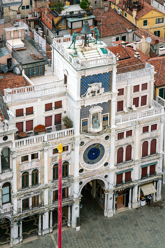 Aerial view of the renaissance clock tower of Venice as seen from St Mark's Campanile