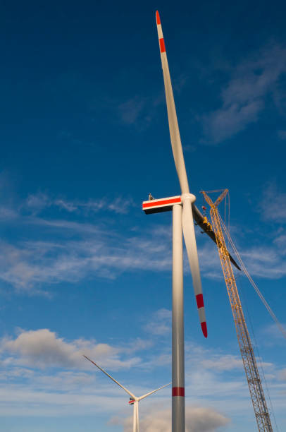 istock Mounting a rotor blade on a wind turbine 1452755933