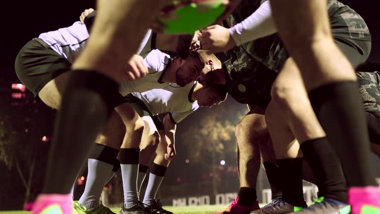 Rugby team practicing scrum