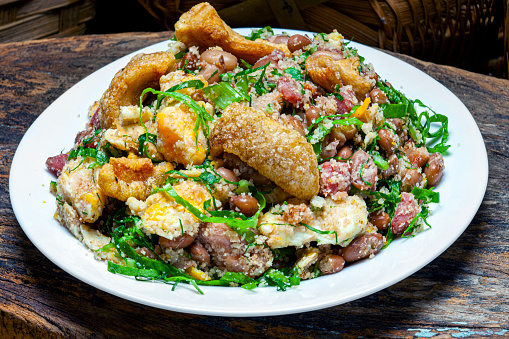 Beans with pork, called tropeiro beans, typical Brazilian food, state of Minas Gerais.