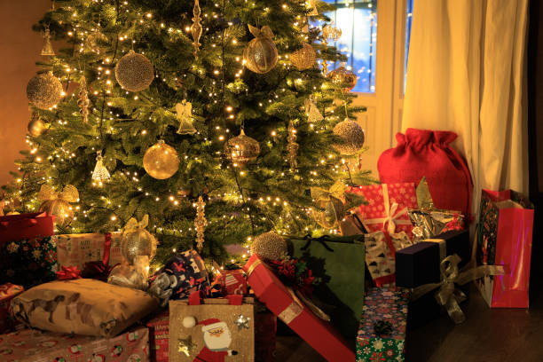 istock House Christmas tree and presents 1452764099