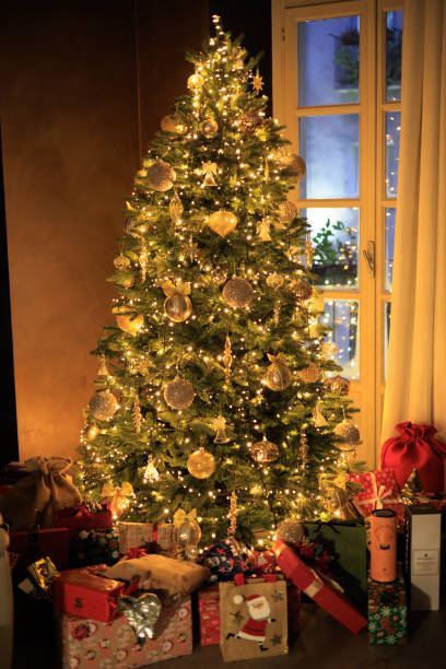 istock House Christmas tree and presents 1452764106