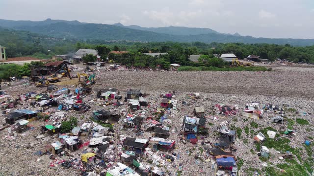 landfills end up in the mountains, and there are slum houses.