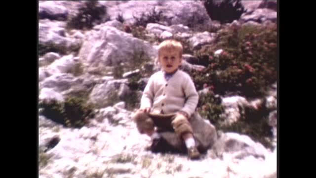 70's 8mm Footage - Little Boy in 1970s Enjoy the View of Ice Formation on Mountain Kanin in Summer, Slovenia