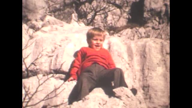 70's 8mm Footage - Little Boy in 1970s Waving in Greeting from the Top of the Rocky Mountain