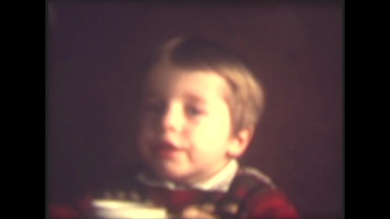 70's 8mm Footage -Cute  Little Boy in 1970s Eating Breakfast and Drinking Milk at Home