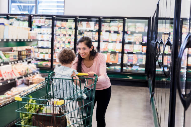istock Single mother smiling at her young daughter 1452774194