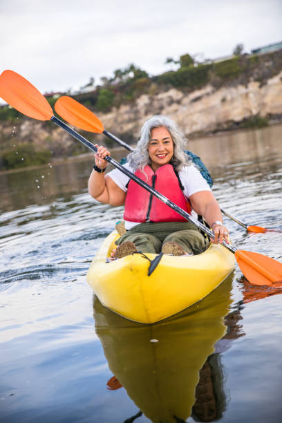 istock Senior Hispanic Couple Kayaking 1452776303
