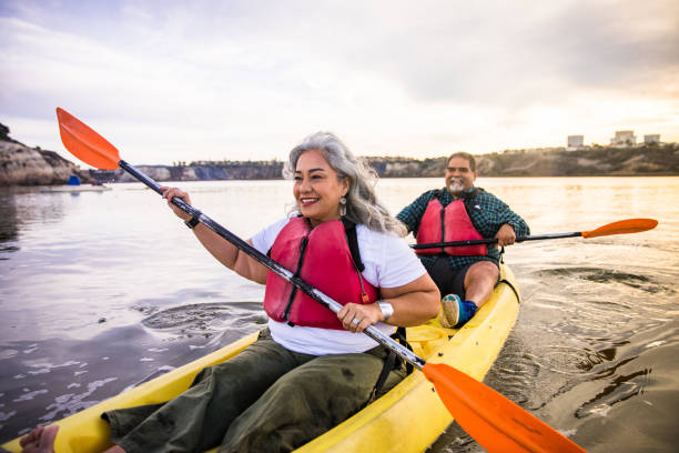istock Senior Hispanic Couple Kayaking 1452776321