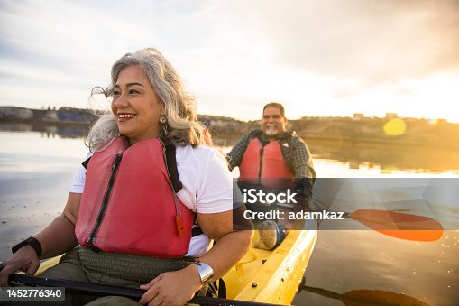 istock Senior Hispanic Couple Kayaking 1452776340