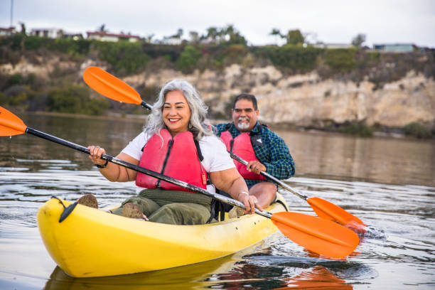 istock Senior Hispanic Couple Kayaking 1452776345