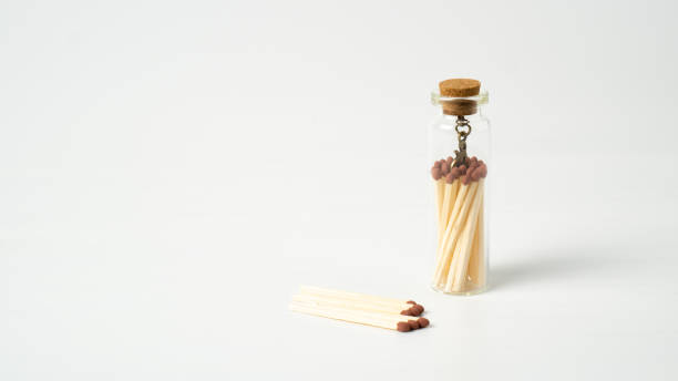 Tiny glass jar with cork top of matches. Matches container. Glass container for matches.