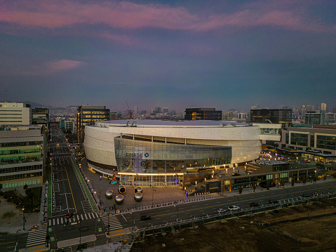 Aerial view of Chase Center with holiday decorations at sunrise.