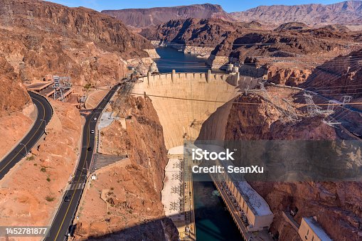 istock Hoover Dam - A panoramic overview of Hoover Dam and its surrounding area, as seen from Mike O'Callaghan - Pat Tillman Memorial Bridge, on a bright sunny Winter day. Nevada - Arizona, USA. 1452781877