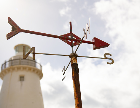 Top of Cape Willoughby lighthouse on Kangaroo Island and red weather vane shows wind is blowing from the south. Erected in 1852.