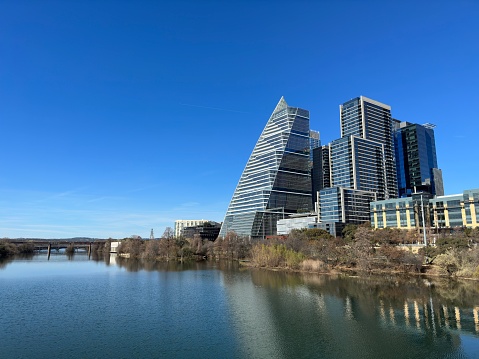 The Austin, Texas urban skyline as seen on a beautiful, clear day from the First Street Jefferson Davis Bridge above Town Lake (Colorado River).