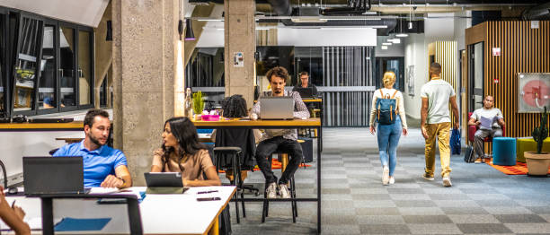 Two entrepreneurs leaving the loft apartment office