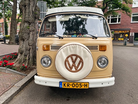 Den Haag, Netherlands - July 06 2022: a hipster hippie volkswagen van from the 70s parked on a street