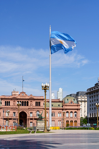 Plaza de Mayo in Buenos Aries. Central square in Buenos Aires with the Argentinean flag in the summer next to the presidential palace. Attractions, travel and tourism in Argentina. High quality photo