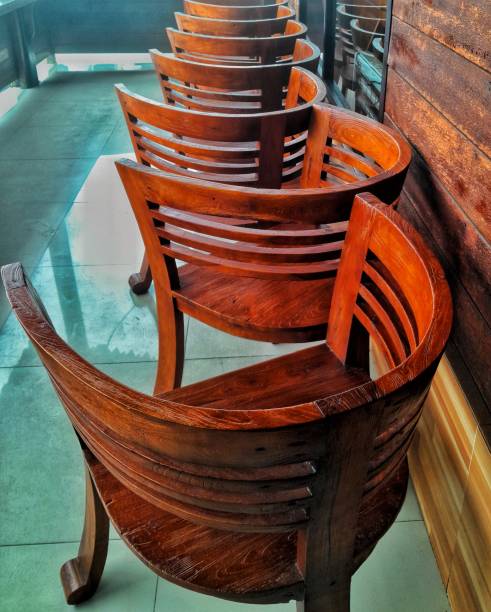 istock ancient wooden chairs arranged straight 1452796971